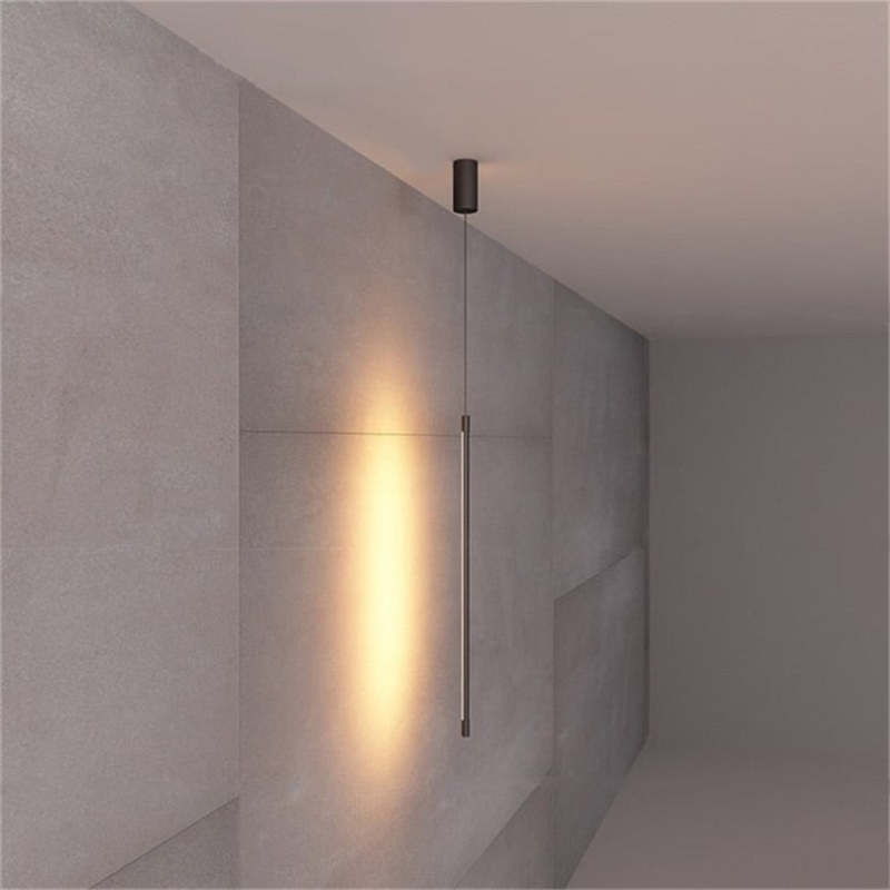 Edge Minimalist Linear Pendant Light on textured wall