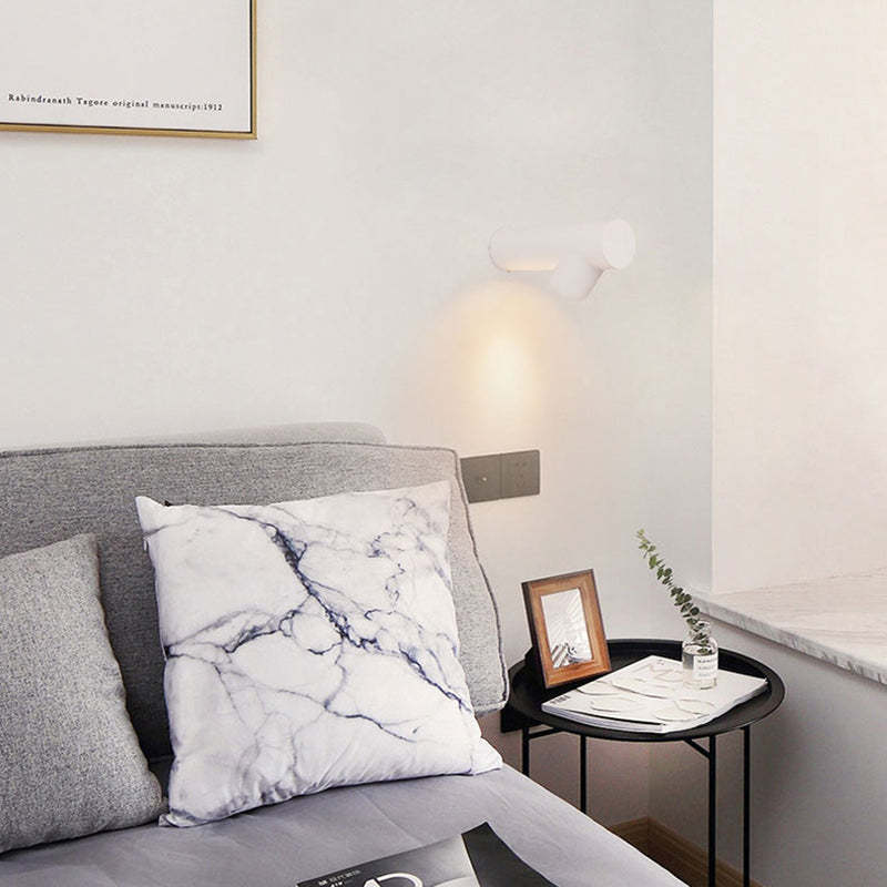 Orr Modern Wall Lamp illuminating bedroom interior