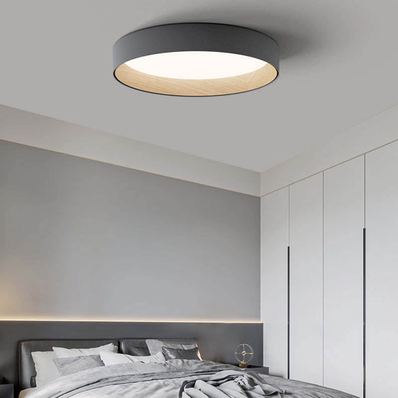 Modern bedroom featuring Quinn Round Flush Mount Ceiling Light