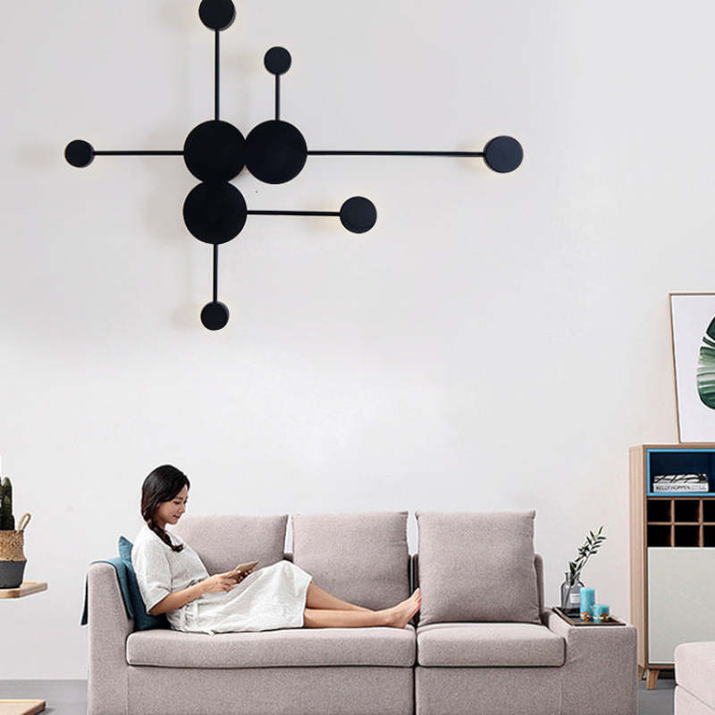 Emyr Nordic Wall Lamp over sofa in living room