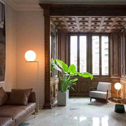 Valentina modern floor lamp in a living room with globe light