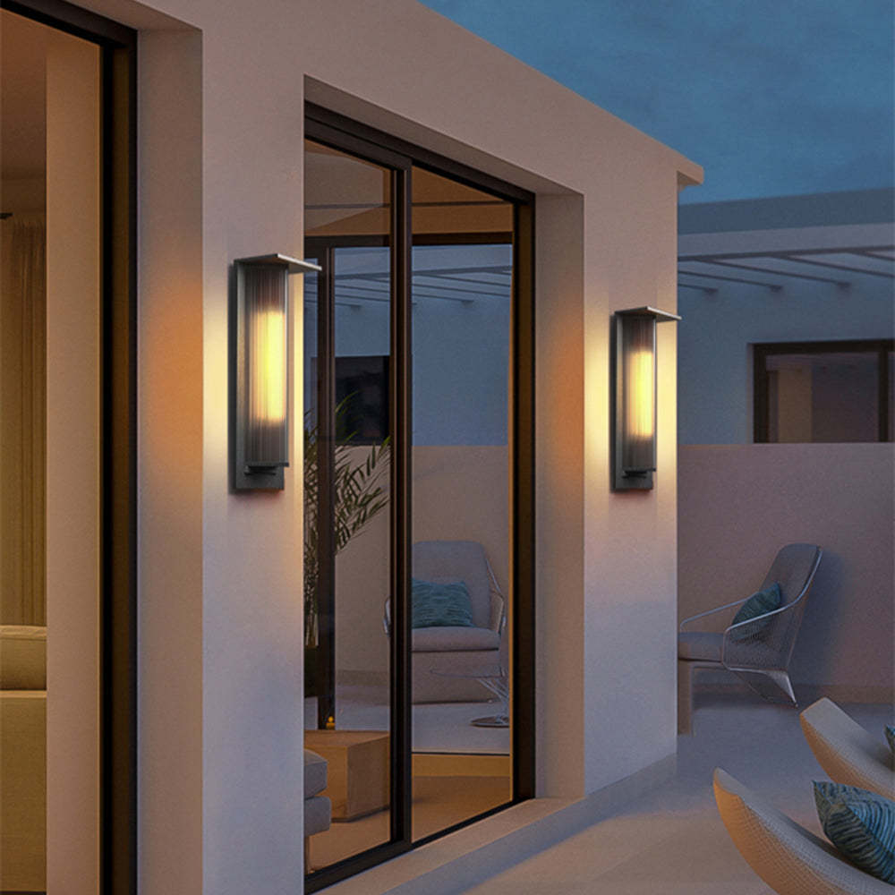 Orr Modern Outdoor Wall Lamp illuminating patio at night