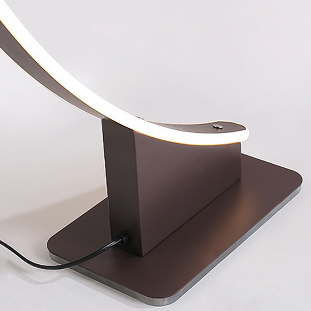Las Sola Edge arched floor lamp base detail.