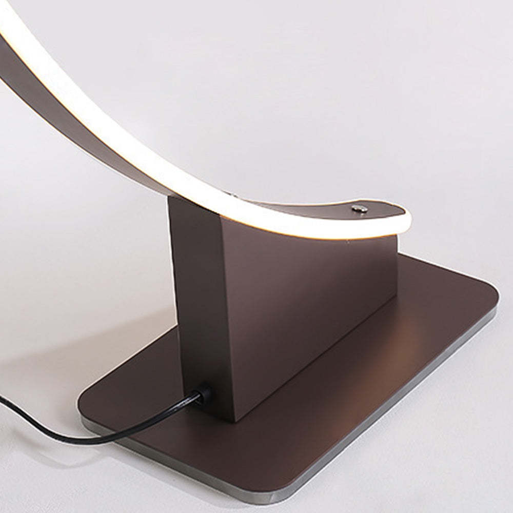 Las Sola Edge arched floor lamp base detail.