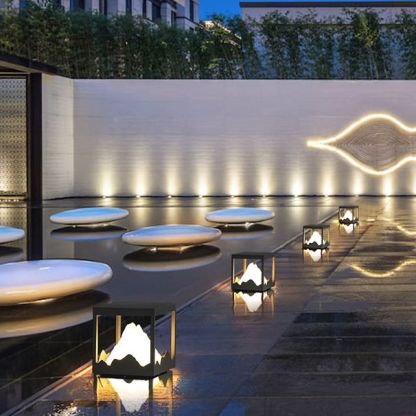 Riley mountain outdoor lamp in modern garden setting.