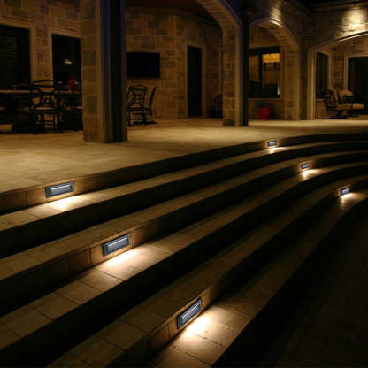 Deck step lights illuminate outdoor stairs