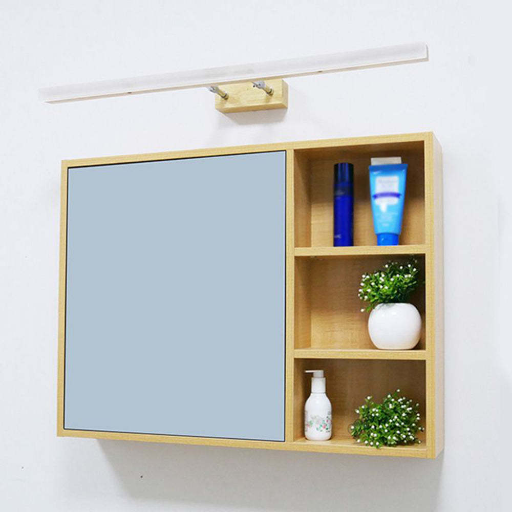 Ozawa wall lamp above wooden bathroom mirror vanity.