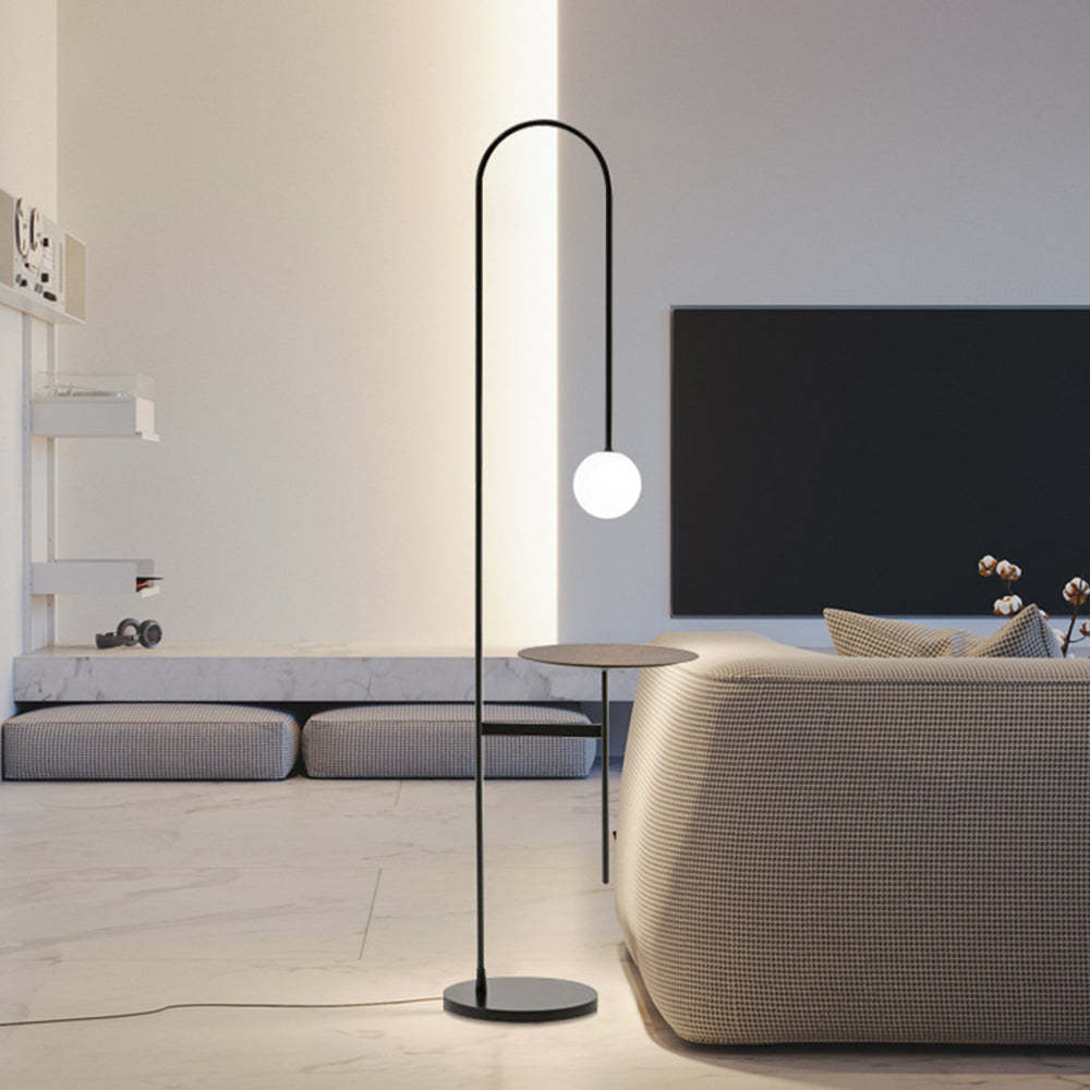 Modern floor lamp with table in living room. Valentina lighting solution.