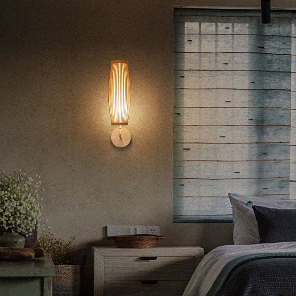 Muto bamboo wall light in bedroom. Japanese rattan lamp.