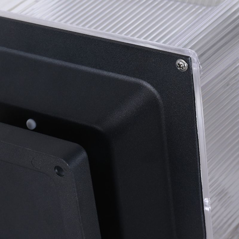 Riley LED outdoor lamp close-up, metal and acrylic detail.