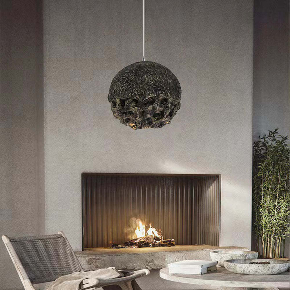 Industrial pendant light over fireplace