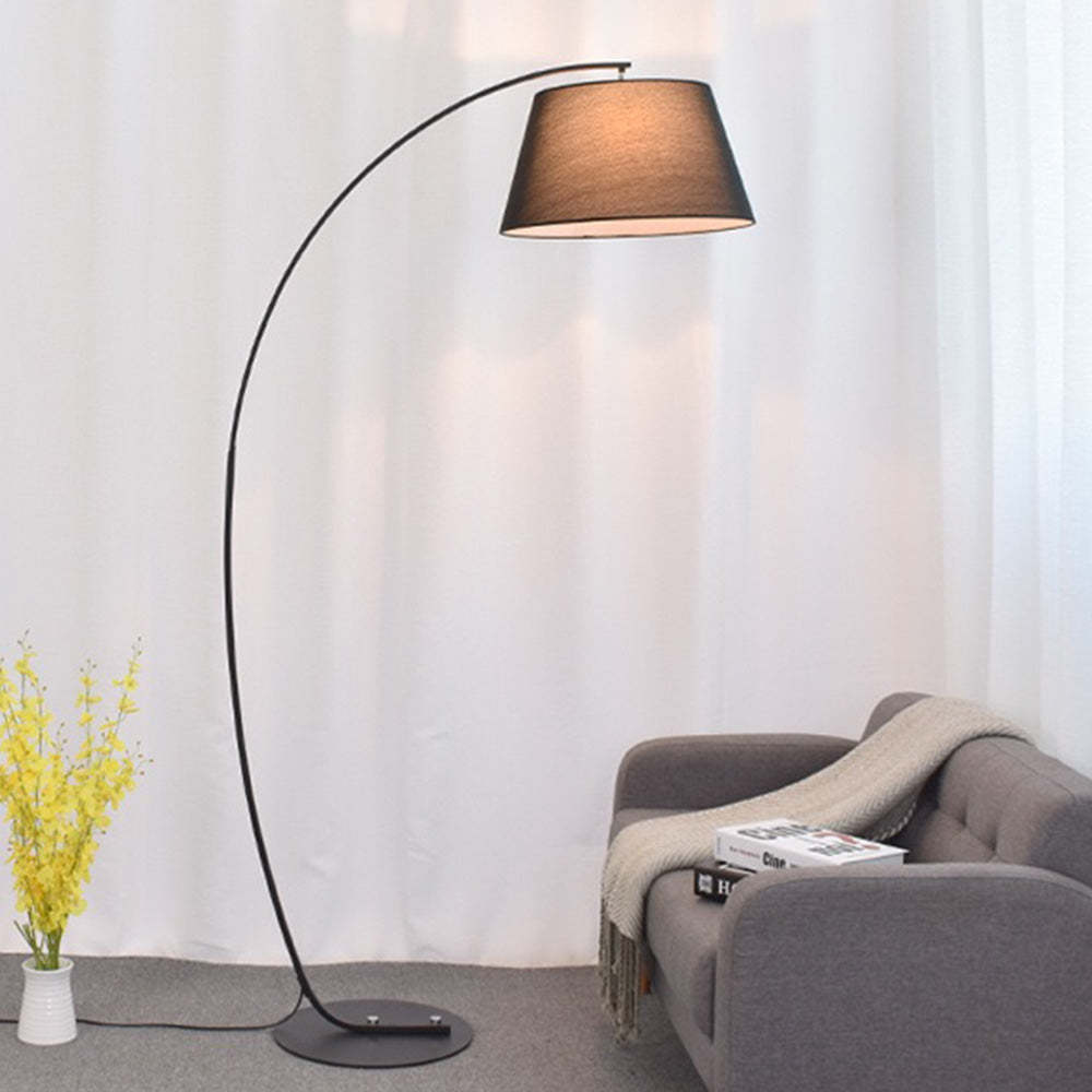 Salgado Arc Floor Lamp illuminating a living room