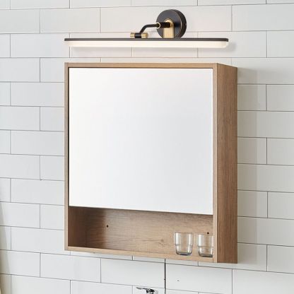 Leigh brass vanity light above bathroom mirror cabinet