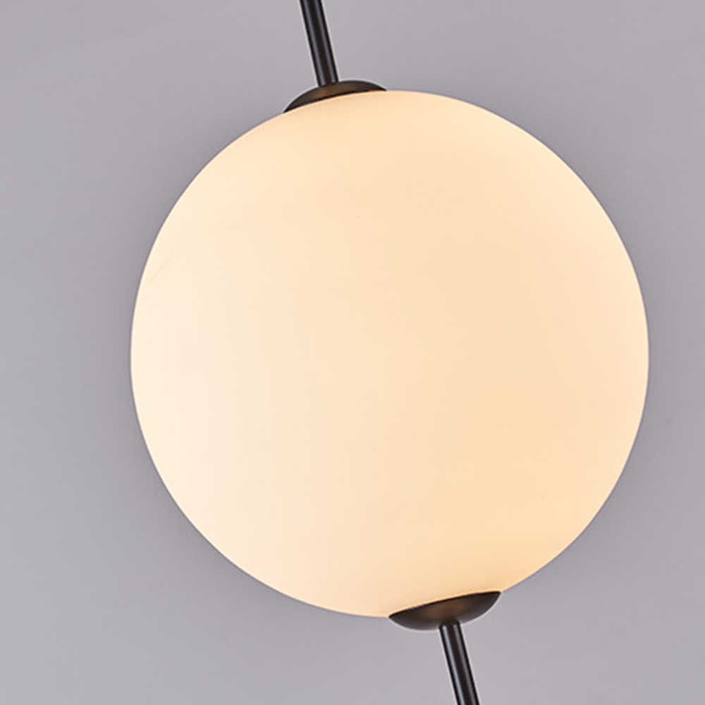 Close-up of Valentina Ball Pendant Light, spherical glass shade.