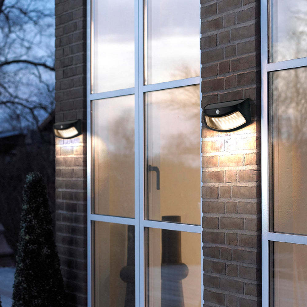 Orr Modern Deck Step Lights illuminating building exterior