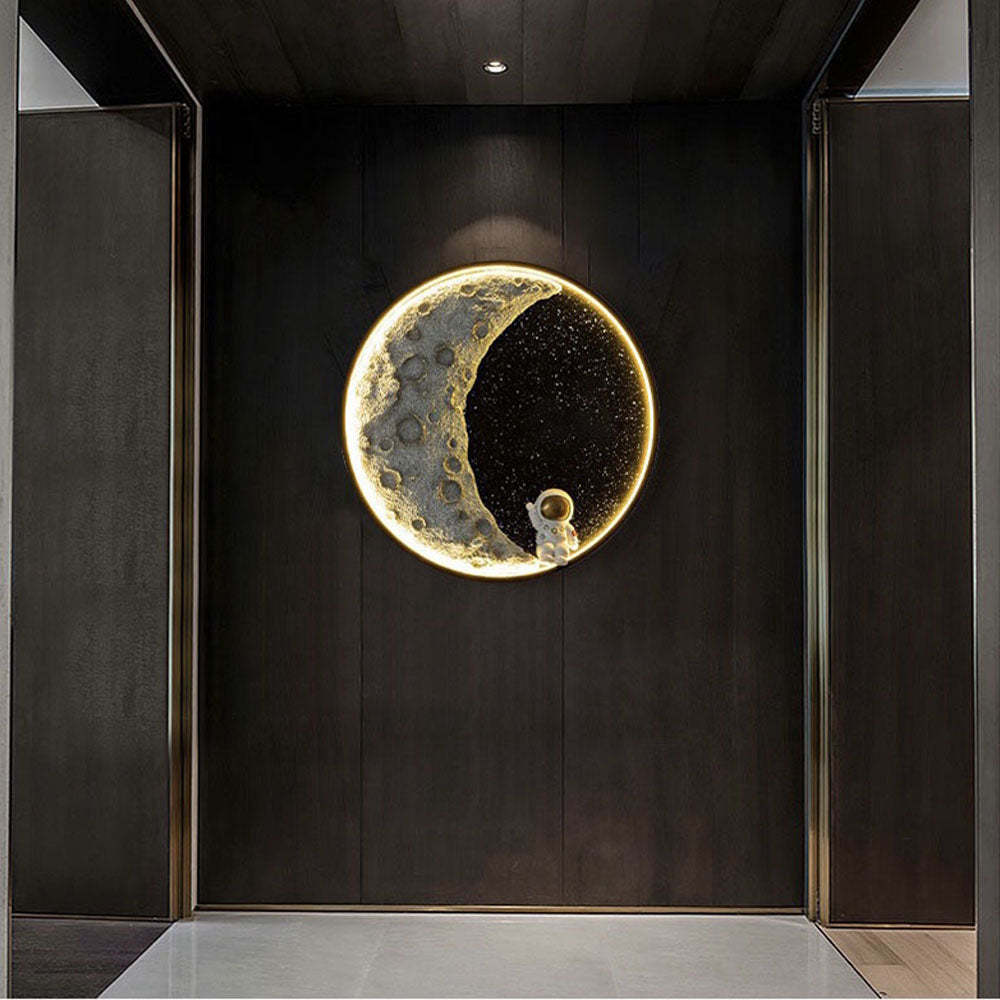 Elif Astronaut Moon Wall Lamp on dark wood wall