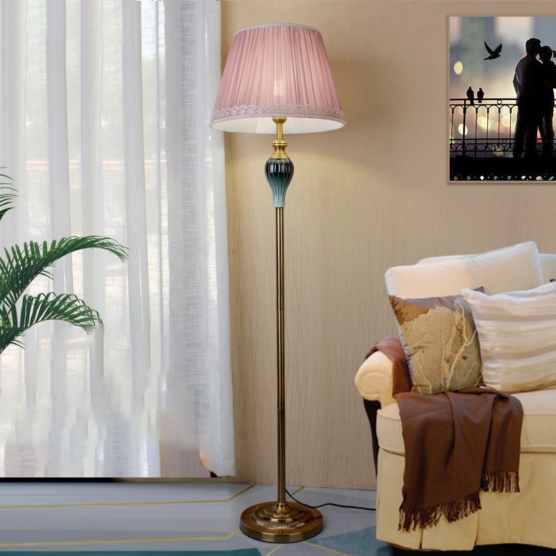 Eryn Antique Floor Lamp with pink shade in living room, Las Sola