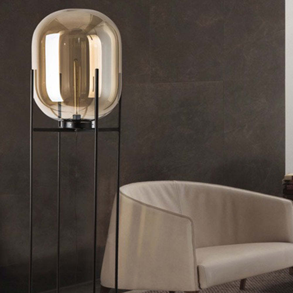 Modern floor lamp in living room with sofa. Salgado lamp.