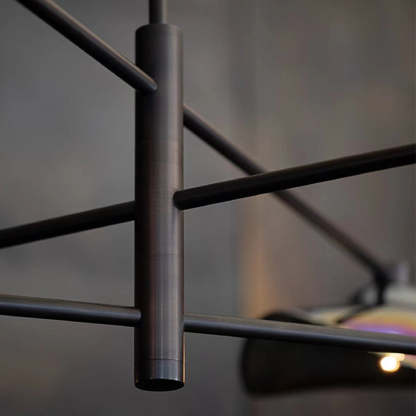 Modern branch pendant light, metal frame detail.
