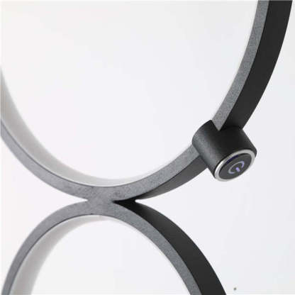 Arisha floor lamp power button. Modern lighting detail.