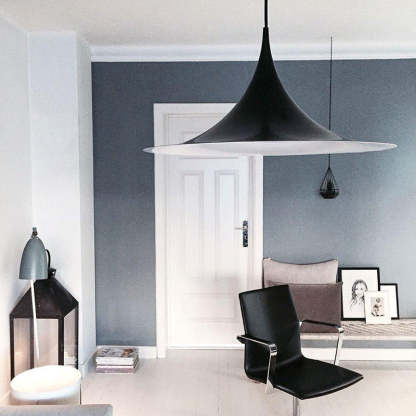 Modern black pendant light in living room interior
