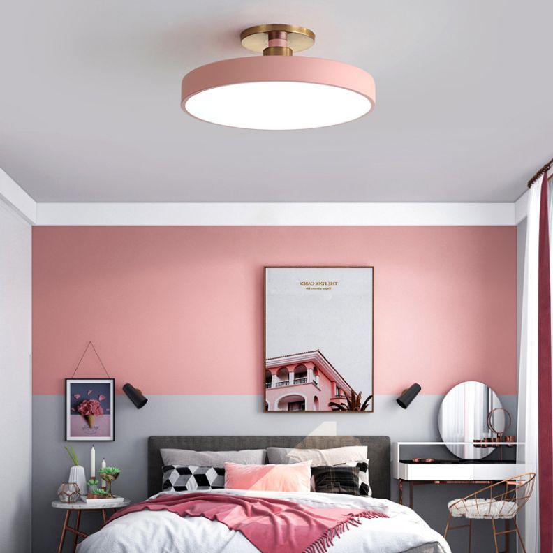 Pink Morandi ceiling light in modern bedroom setting.