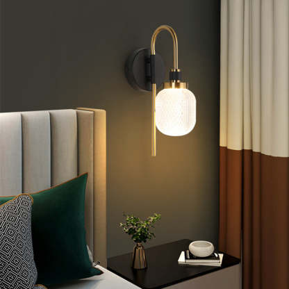 Modern metal wall lamp with acrylic shade in bedroom