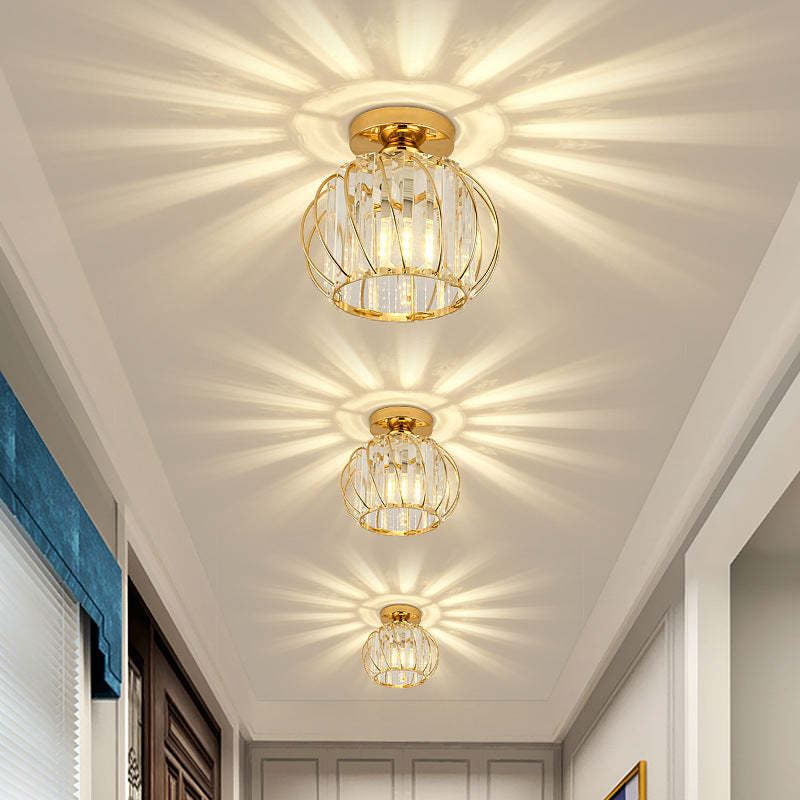 Gold crystal ceiling lights illuminating hallway