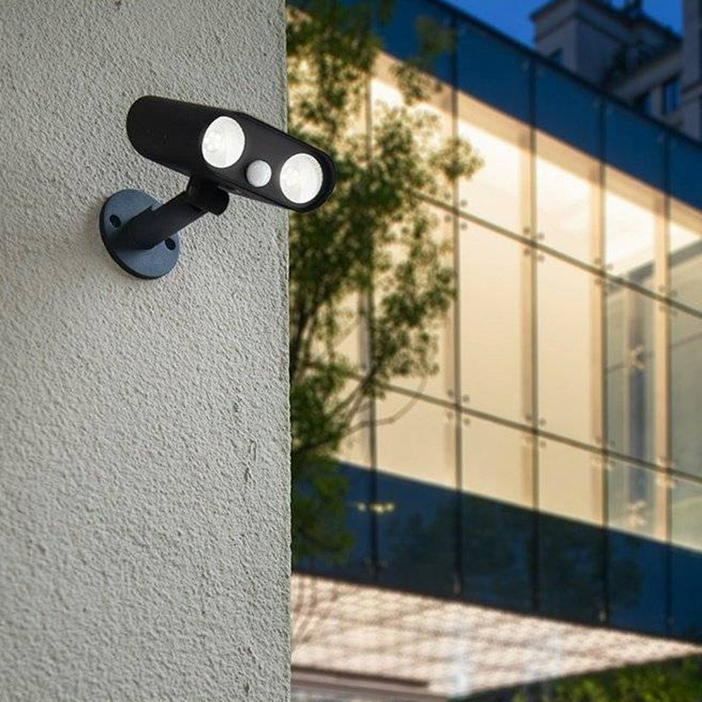 Modern Orr outdoor spotlight on a textured wall.