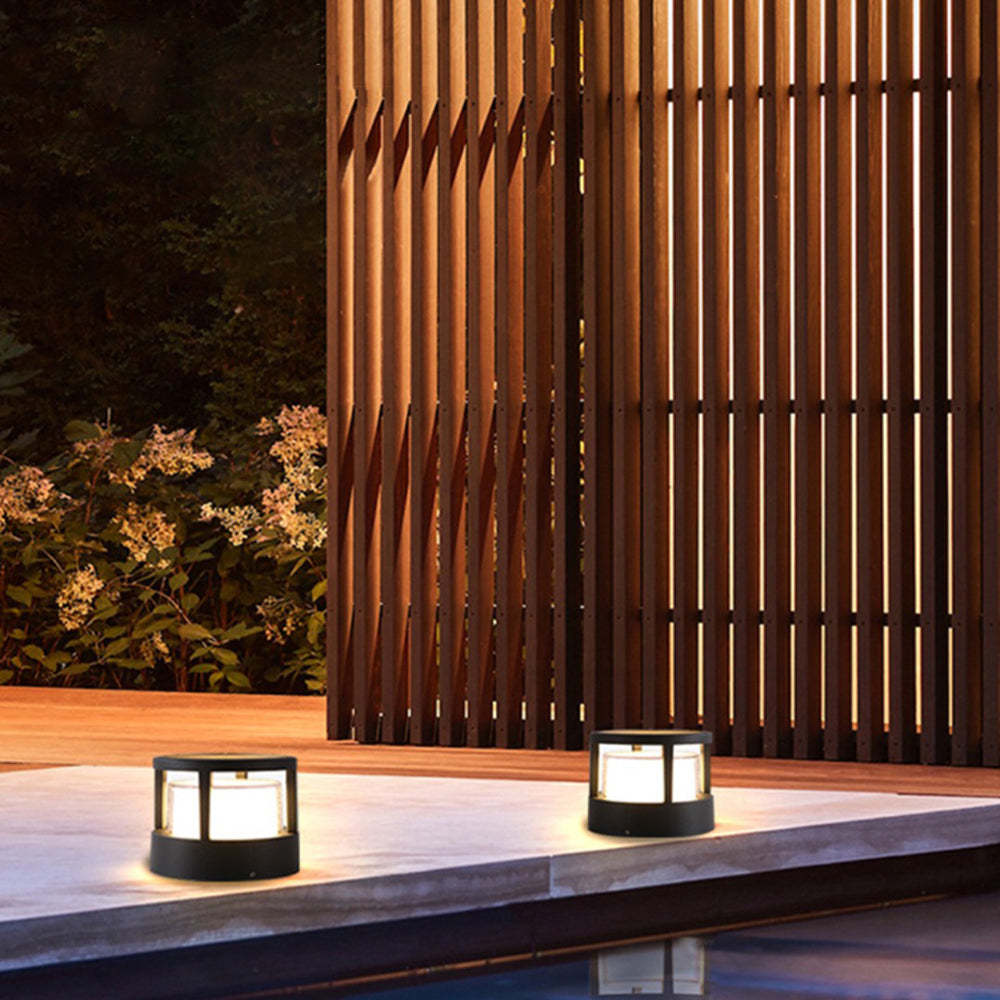 Pena bollard lights illuminating outdoor patio
