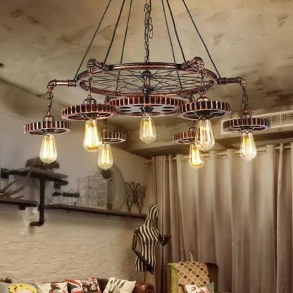 Alessio metal gear pendant light in bronze finish.