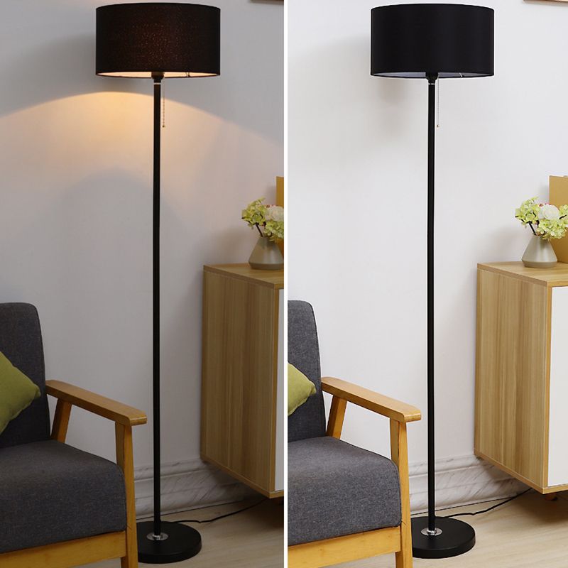 Eryn black cylinder floor lamp with fabric shade.
