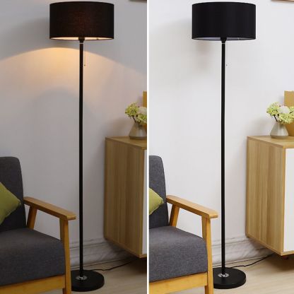 Eryn black cylinder floor lamp with fabric shade.