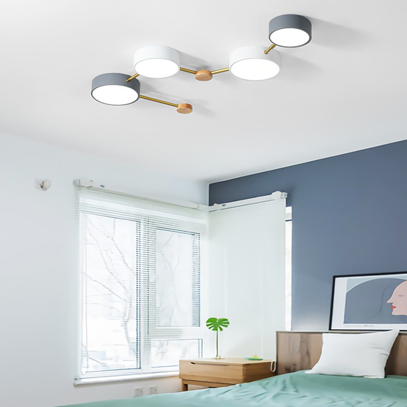 Sienna Modern LED Ceiling Light in bedroom with minimalist decor.