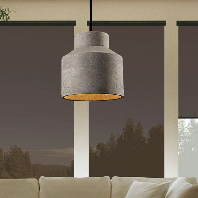 Byers gray cement pendant light over sofa