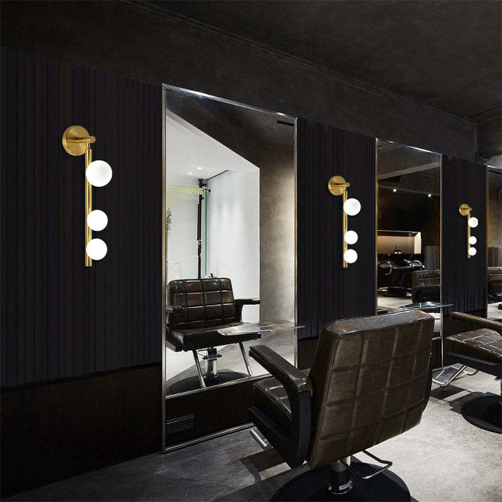 Gold Valentina Globe Wall Lamp in Salon | Las Sola