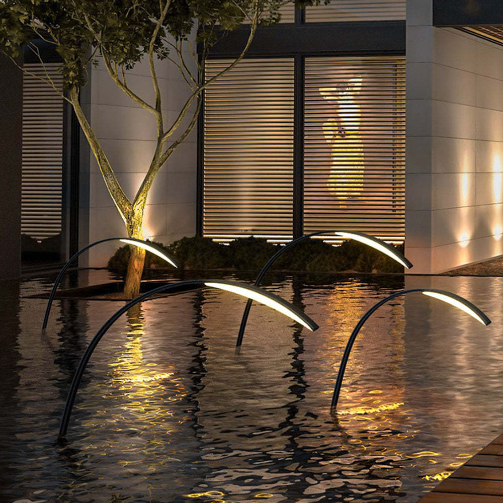 Minimalist Poolside Arc Lamps by Lassola