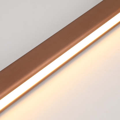 Bronze linear LED pendant light, close-up. Modern lighting. Edge Modern Linear Metal LED Pendant Light