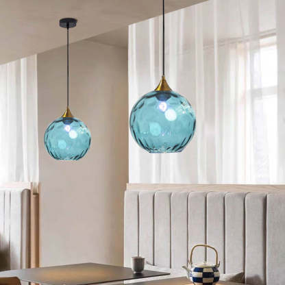 Blue Hailie glass pendant lights for dining ambiance