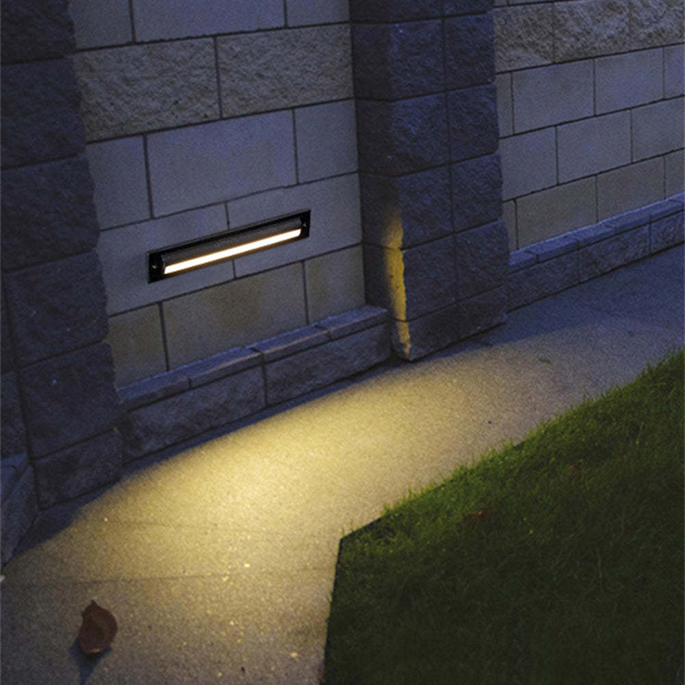 Orr Rectangular Outdoor Step Light illuminating pathway