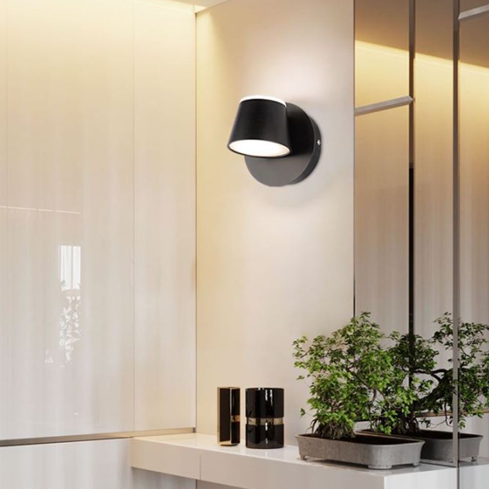 Modern black wall lamp Cooley style in interior