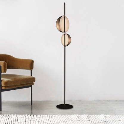 Salgado Floor Lamp illuminating a modern living space by Lassola