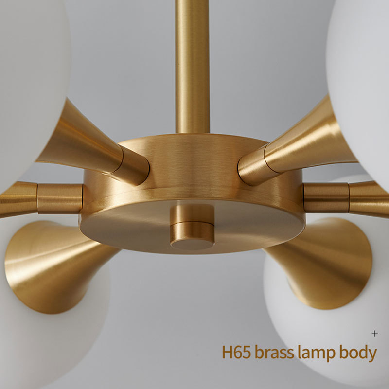 Valentina pendant light: H65 brass fixture, glass bulbs.