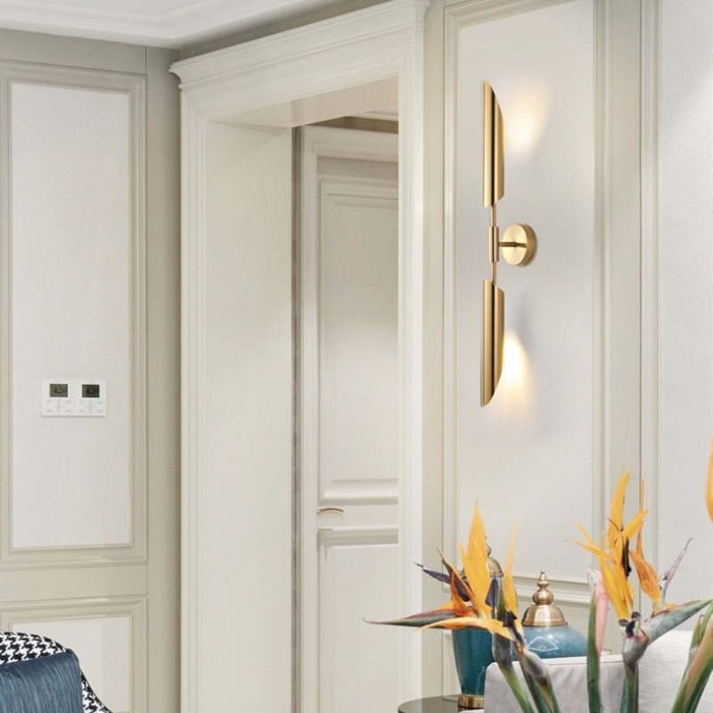 Meza modern gold LED wall lamp in a modern interior