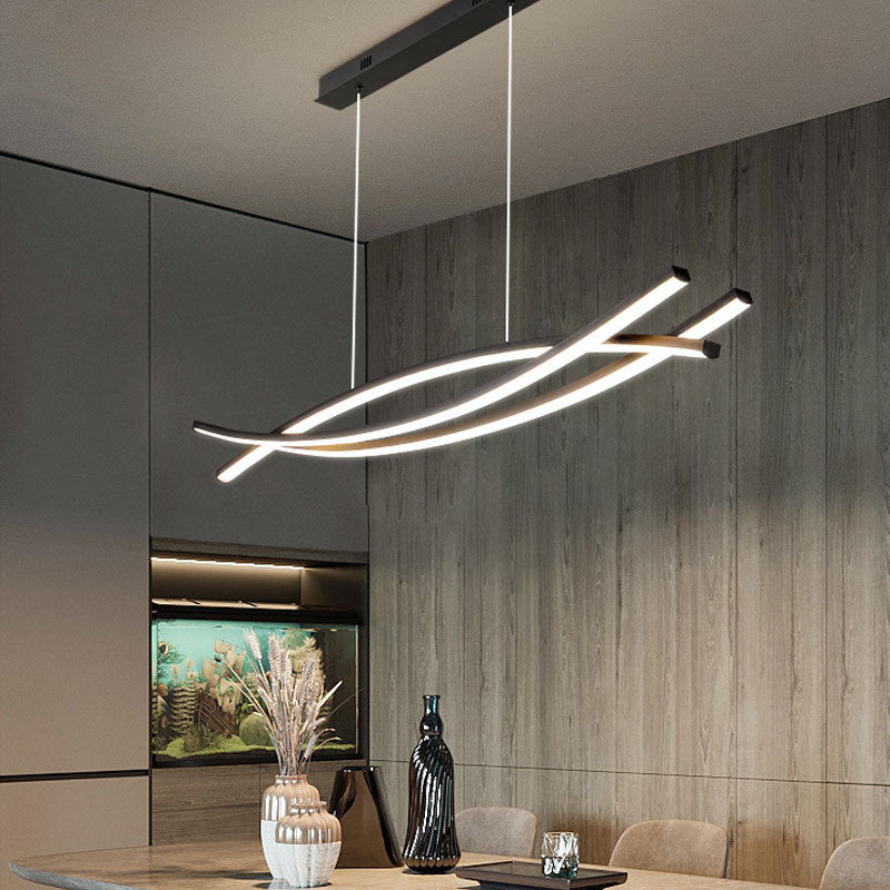 Modern linear pendant lighting over dining table.