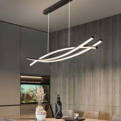 Modern linear pendant lighting over dining table.