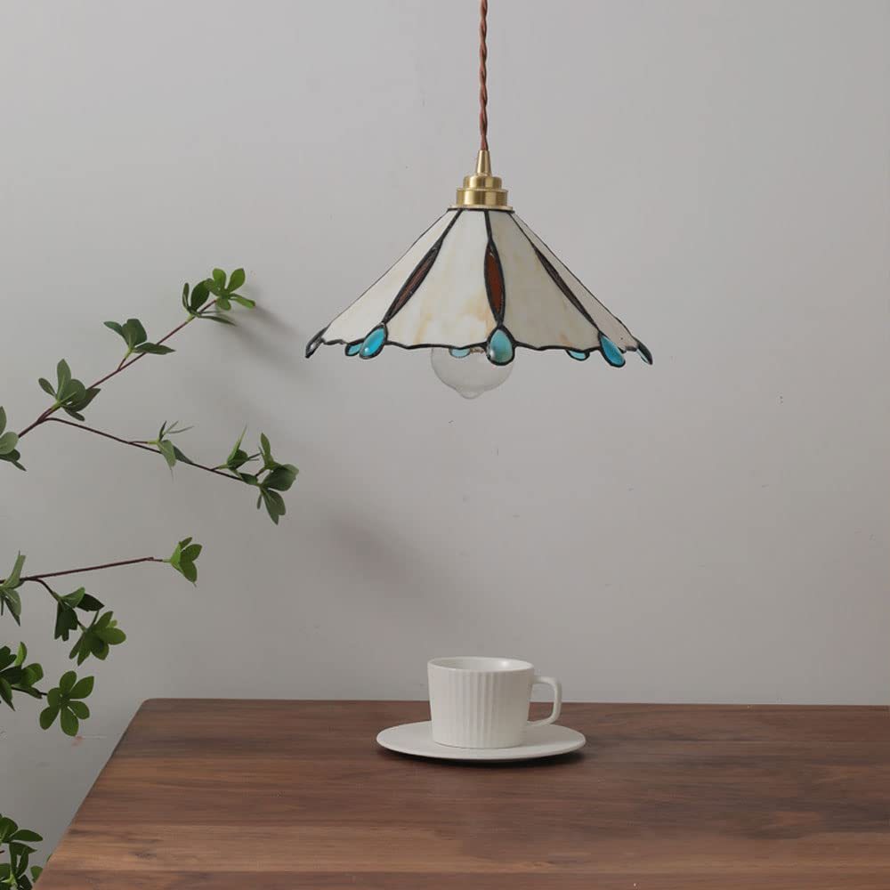 Eryn Vintage Pendant Light above a cup of coffee
