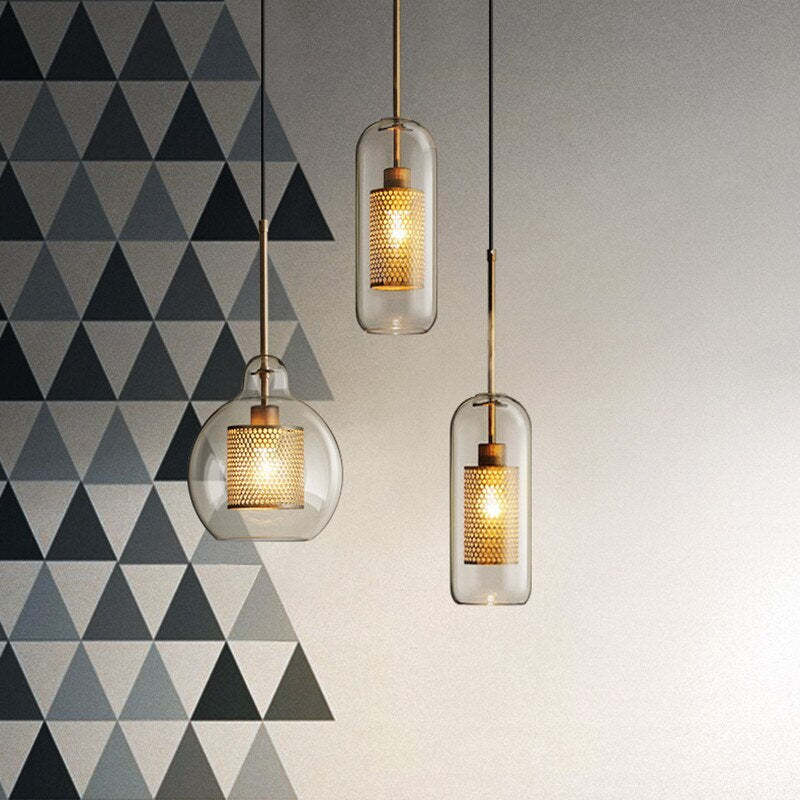 Modern pendant lights with golden accents, metal and glass design