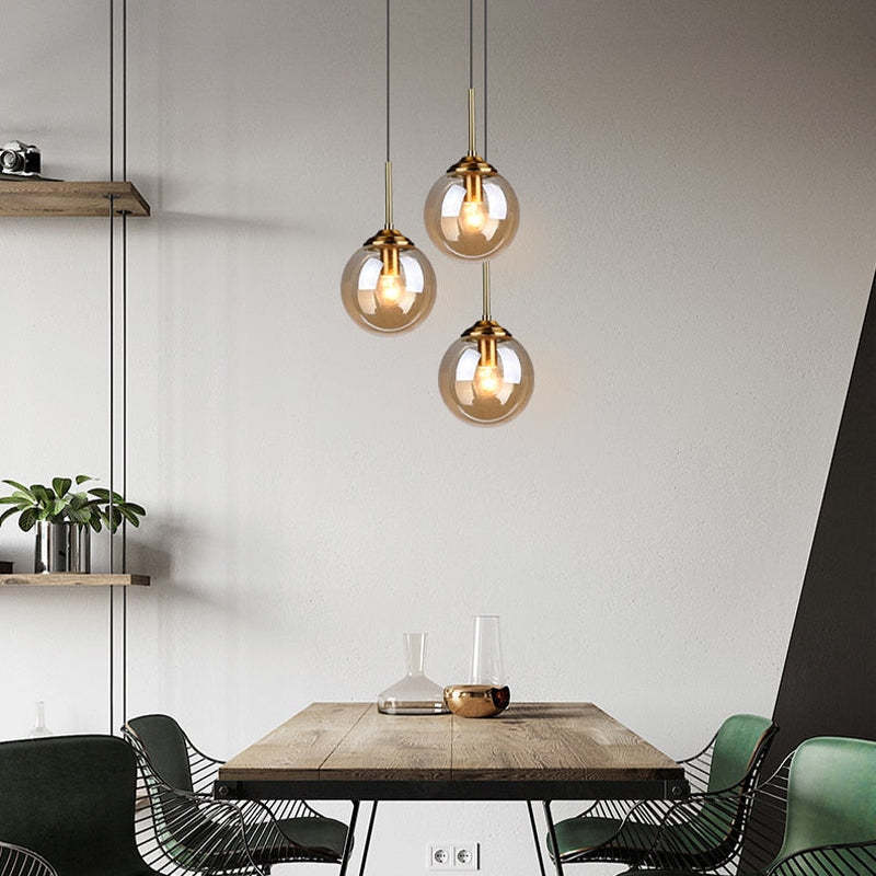 Valentina pendant light, glass ball lights over dining table.