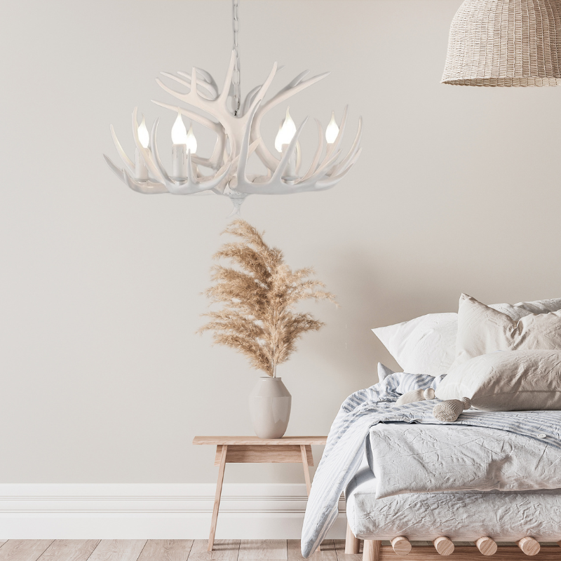 White Deer Antler Chandelier over Bed